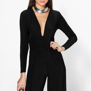 NWT....PLUNGING NECKLINE WIDE LEG JUMPSUIT